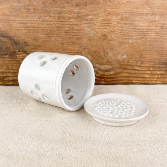 scraper and garlic pot