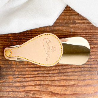 brass and sapphire leather travel shoehorn