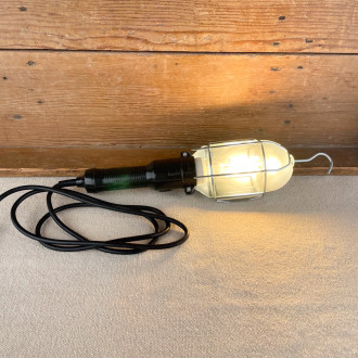Hand lamp with metal frame