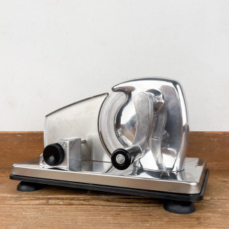 Small stainless steel slicer on suction cups
