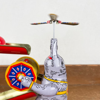 Mechanical wind-up juggling elephant