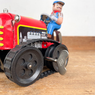 mechanical toy Red tractor and driver