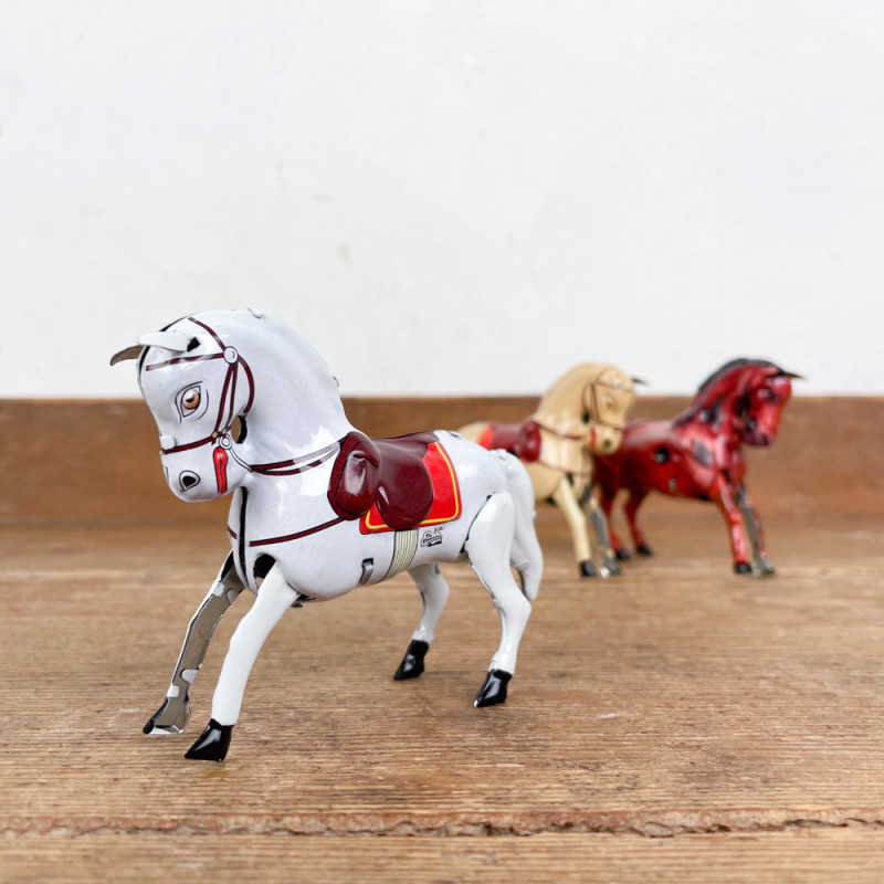 White mechanical horse