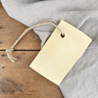 Sliced white Marseille soap on a rope