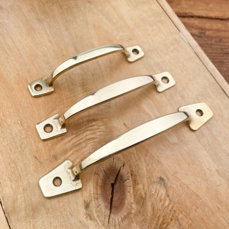 Cupboard handle in polished brass
