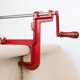 Apple peeler with red clamp