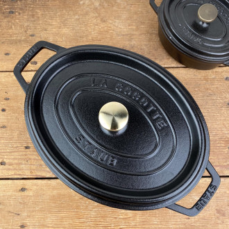 Matte black oval cast-iron casserole