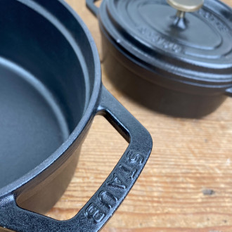 Matte black oval cast-iron casserole