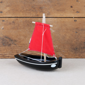 Little black and red Tirot misainier boat