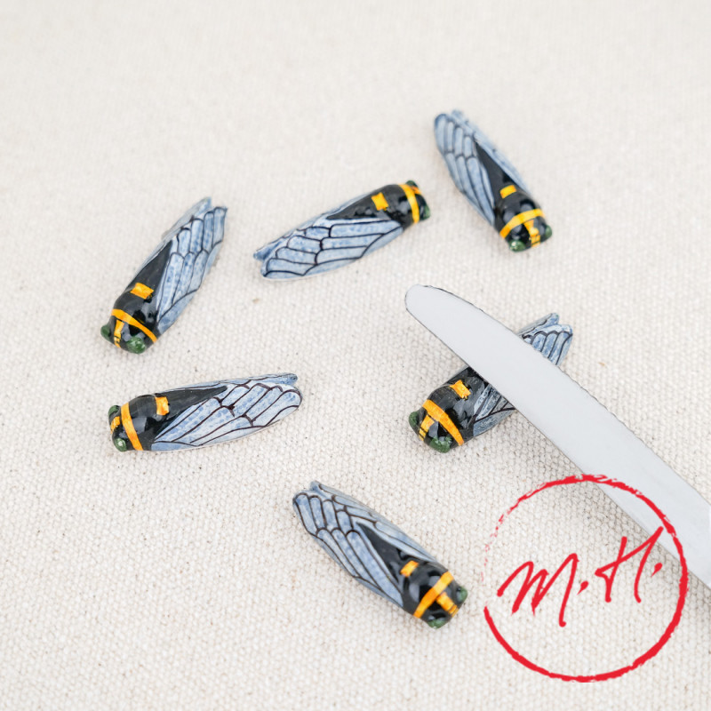 Cicada knife holder