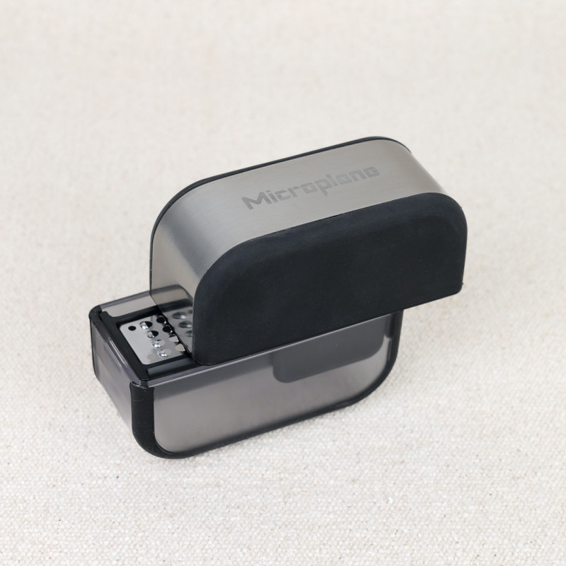 Microplane garlic cutter