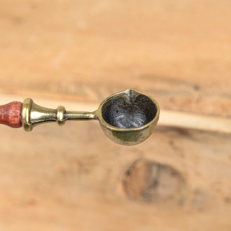 Brass and wood wax spoon