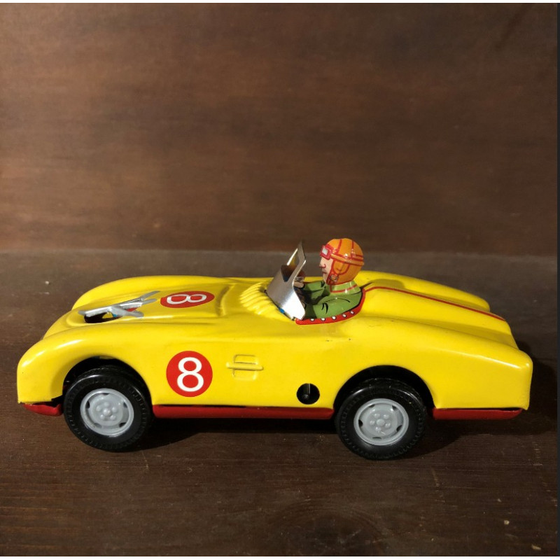 Yellow metal racing car