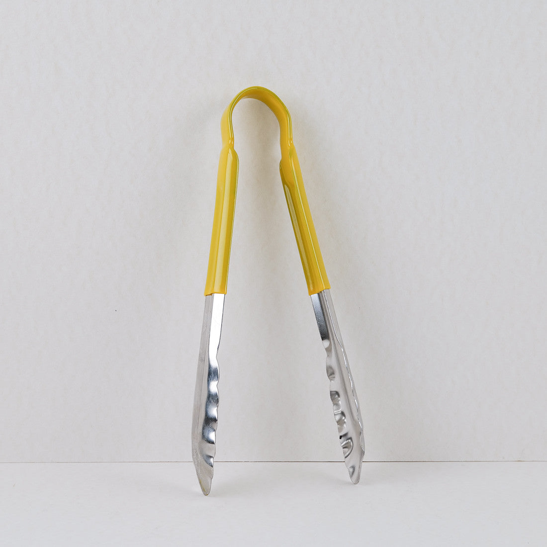 Pince en inox avec manche de couleur