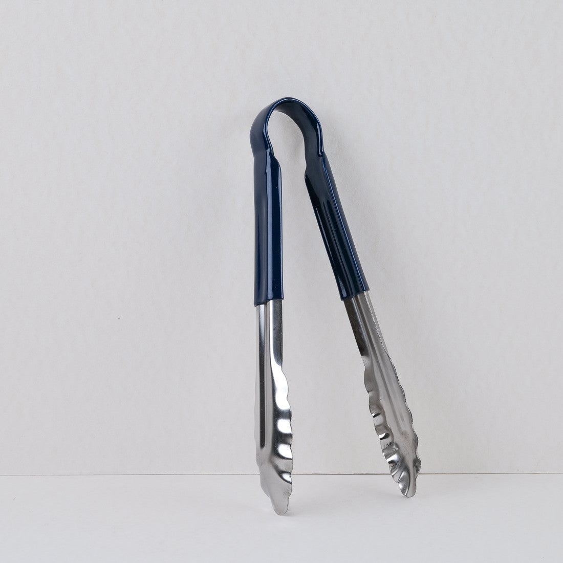 Pince en inox avec manche de couleur