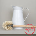 White metal toilet brush and broom