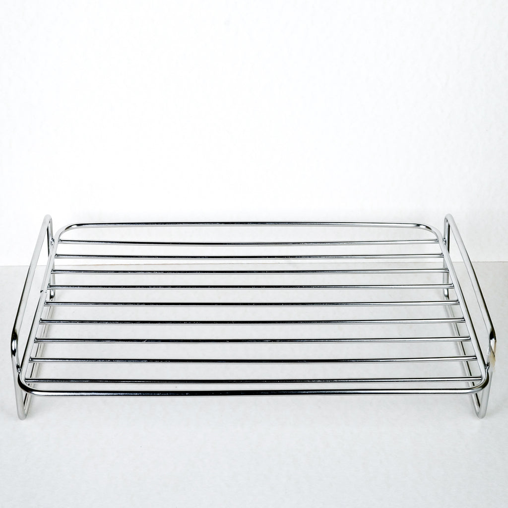 Roasting rack for a baking dish