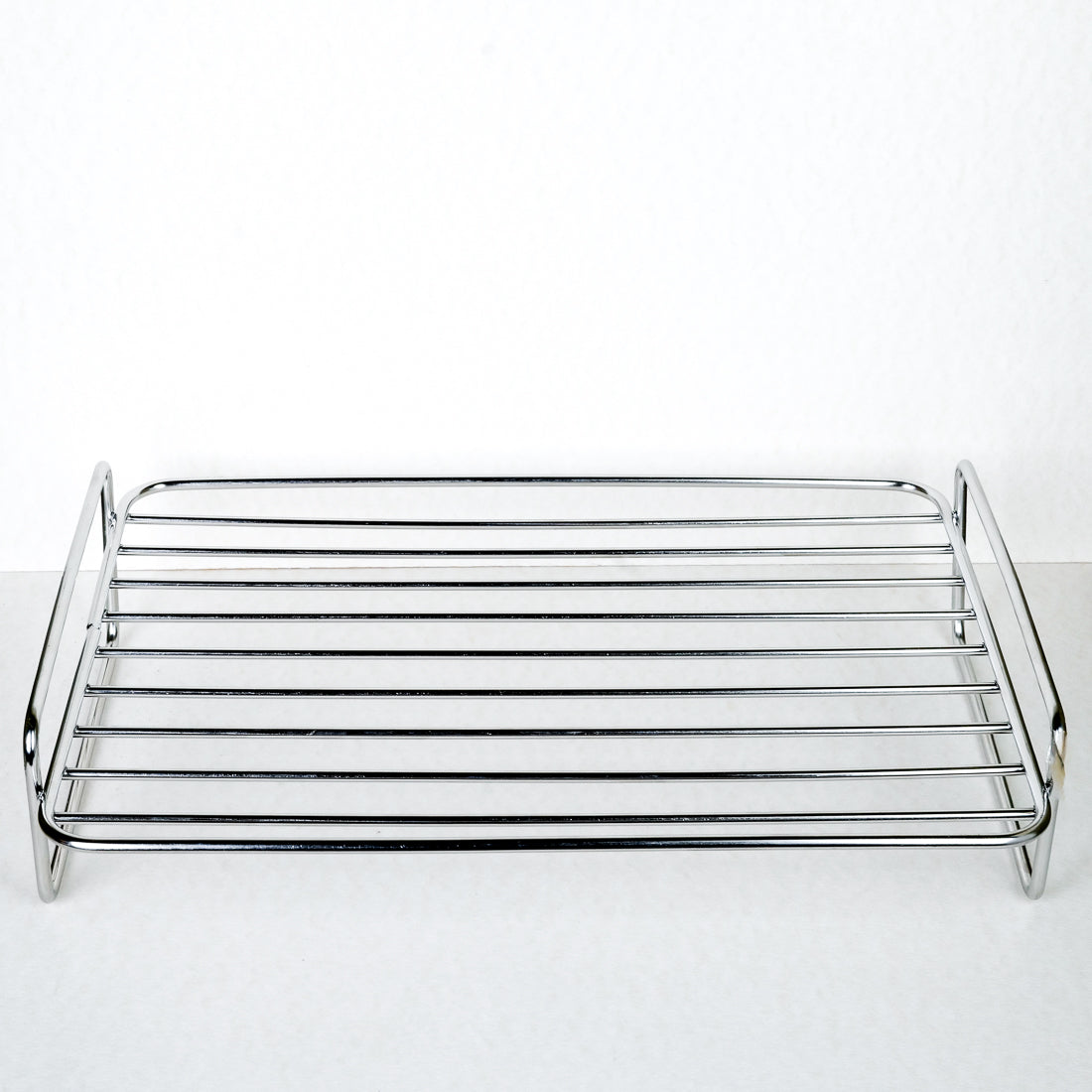 Roasting rack for a baking dish