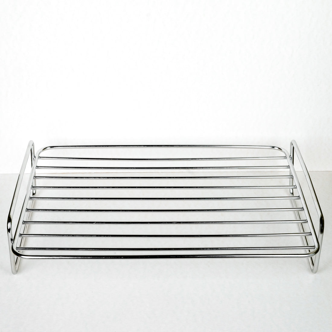 Roasting rack for a baking dish