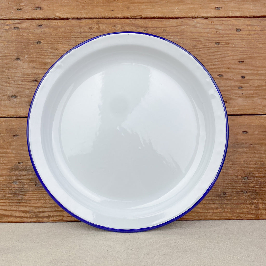 Assiette creuse en email blanc liseré bleu