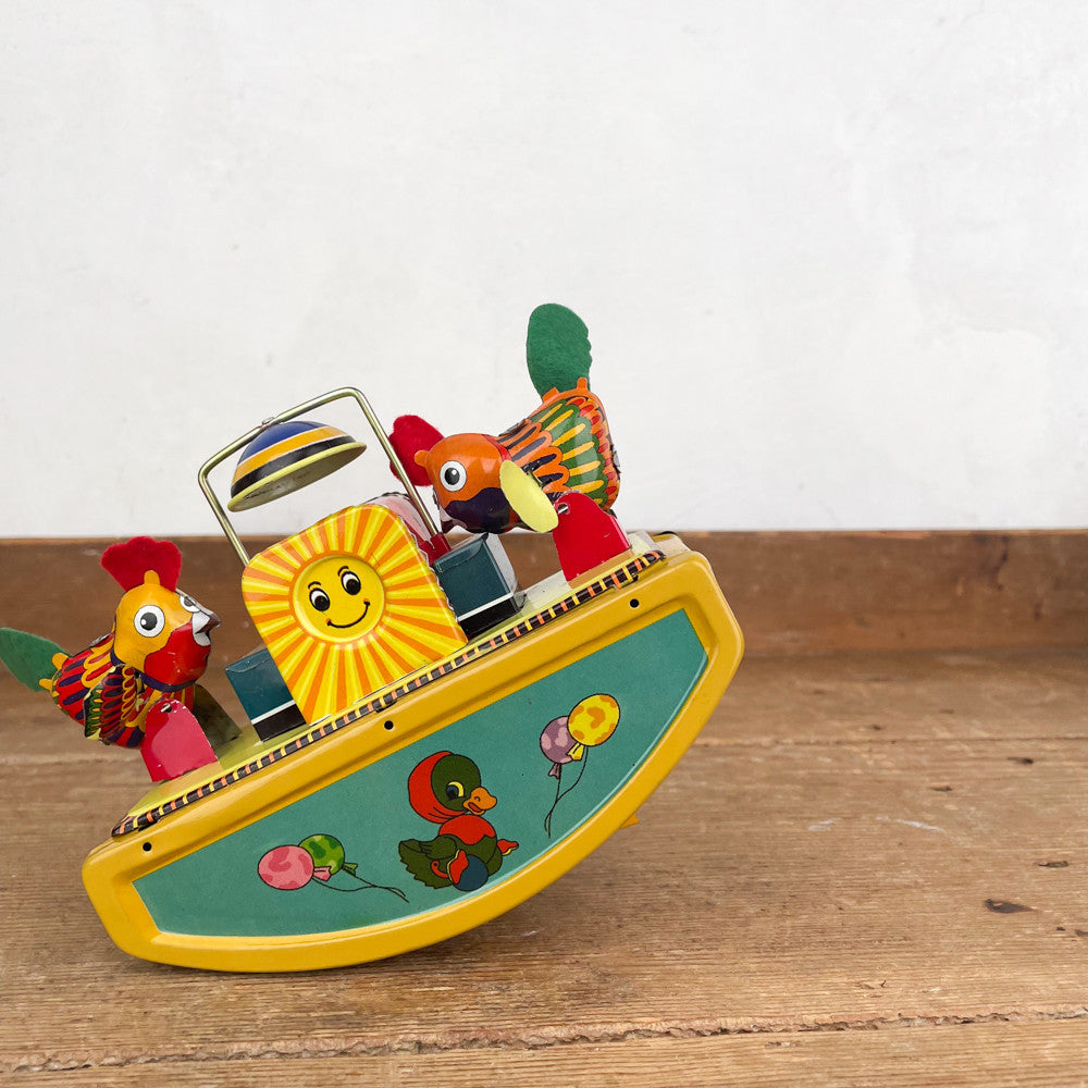 Bascule avec poules mécanique