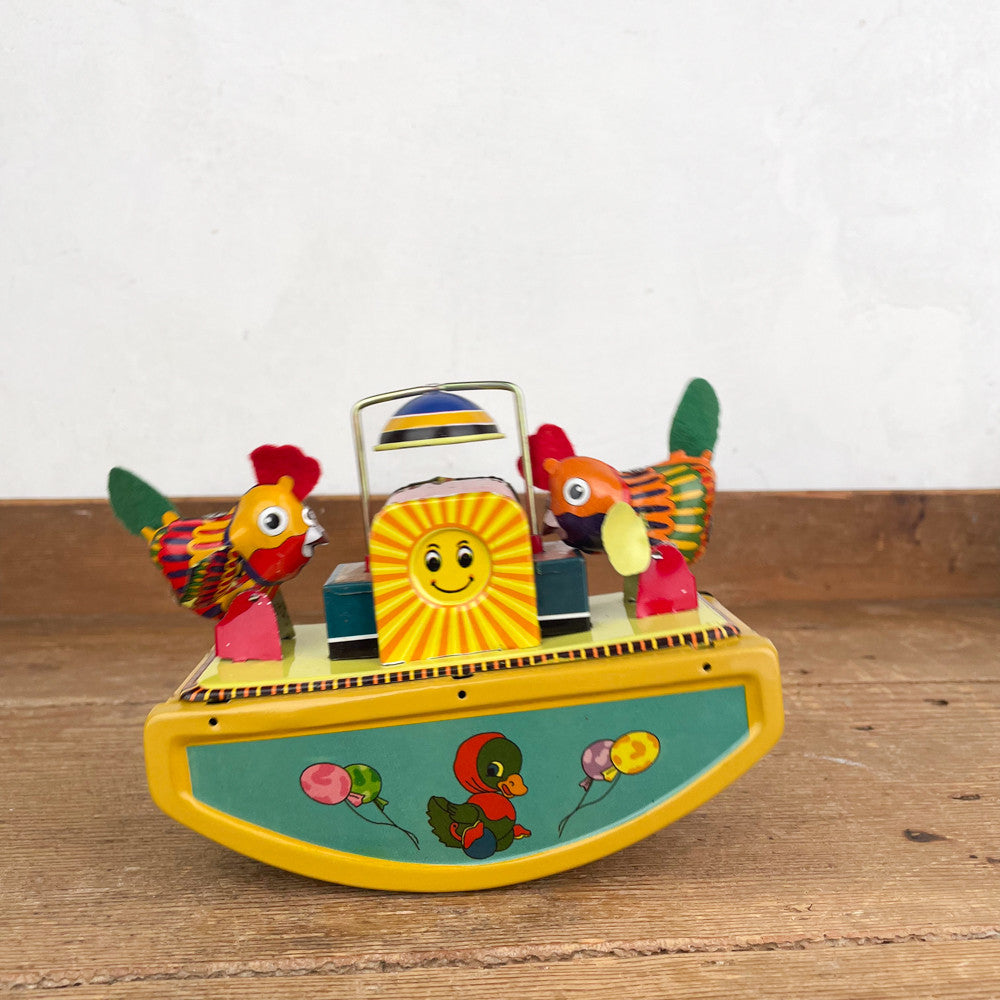 Bascule avec poules mécanique