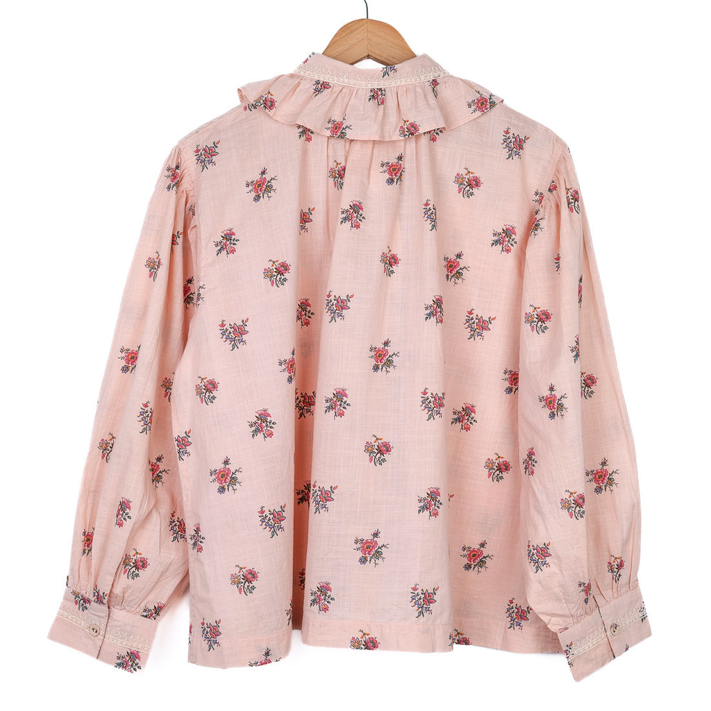 Blouse rose à fleurs