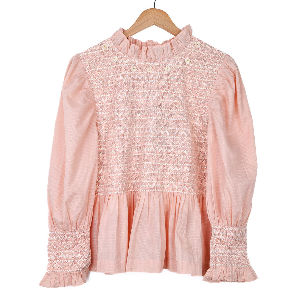 Blouse rose à smocks