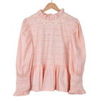 Blouse rose à smocks