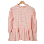 Blouse rose à smocks