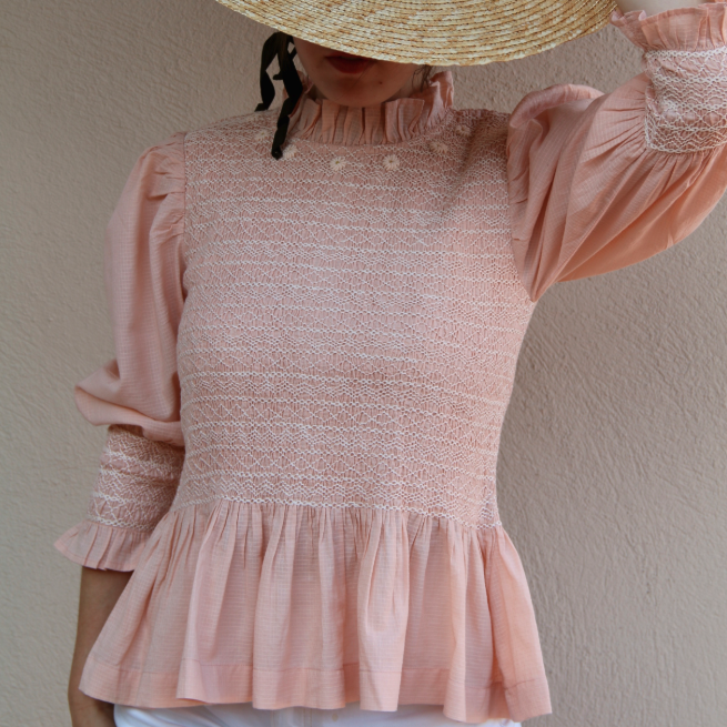 Blouse rose à smocks