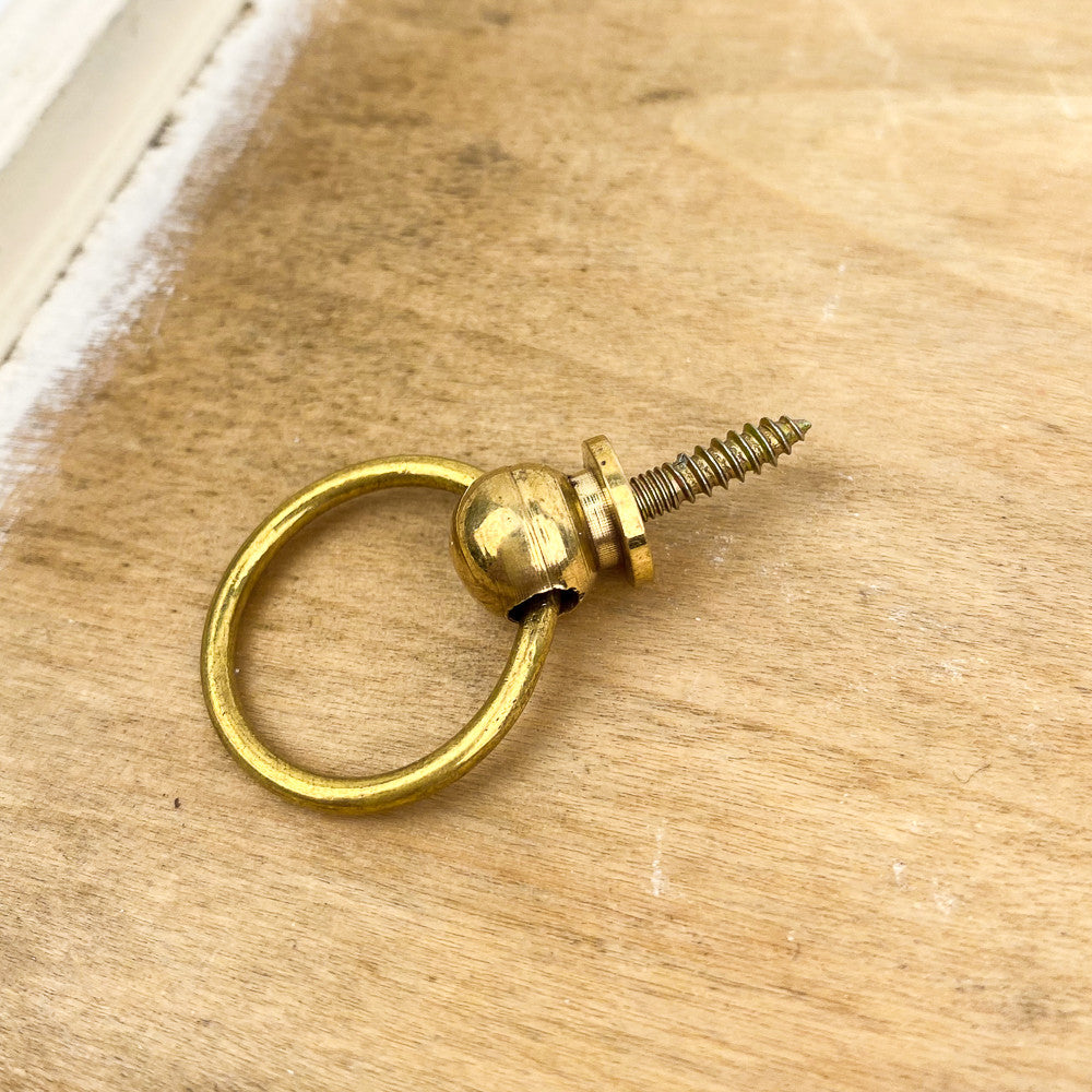 Bouton anneau en laiton poli