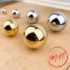 Bouton boule en laiton