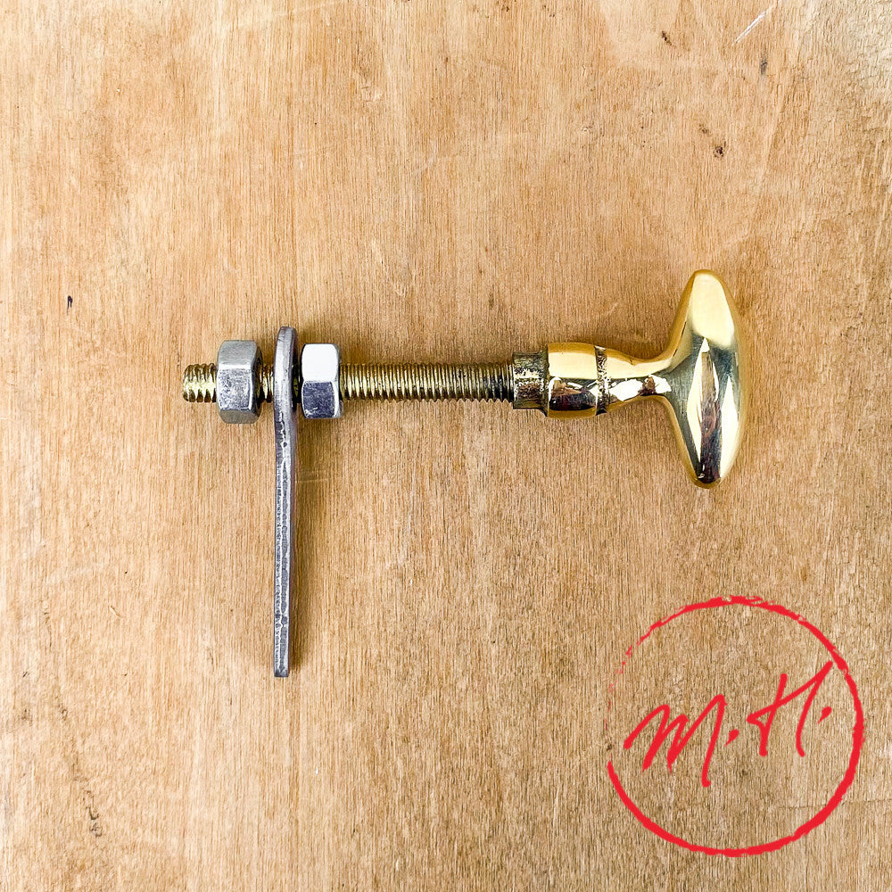 Bouton clavette olive en laiton poli