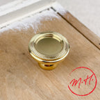 Bouton cuvette molette en laiton poli