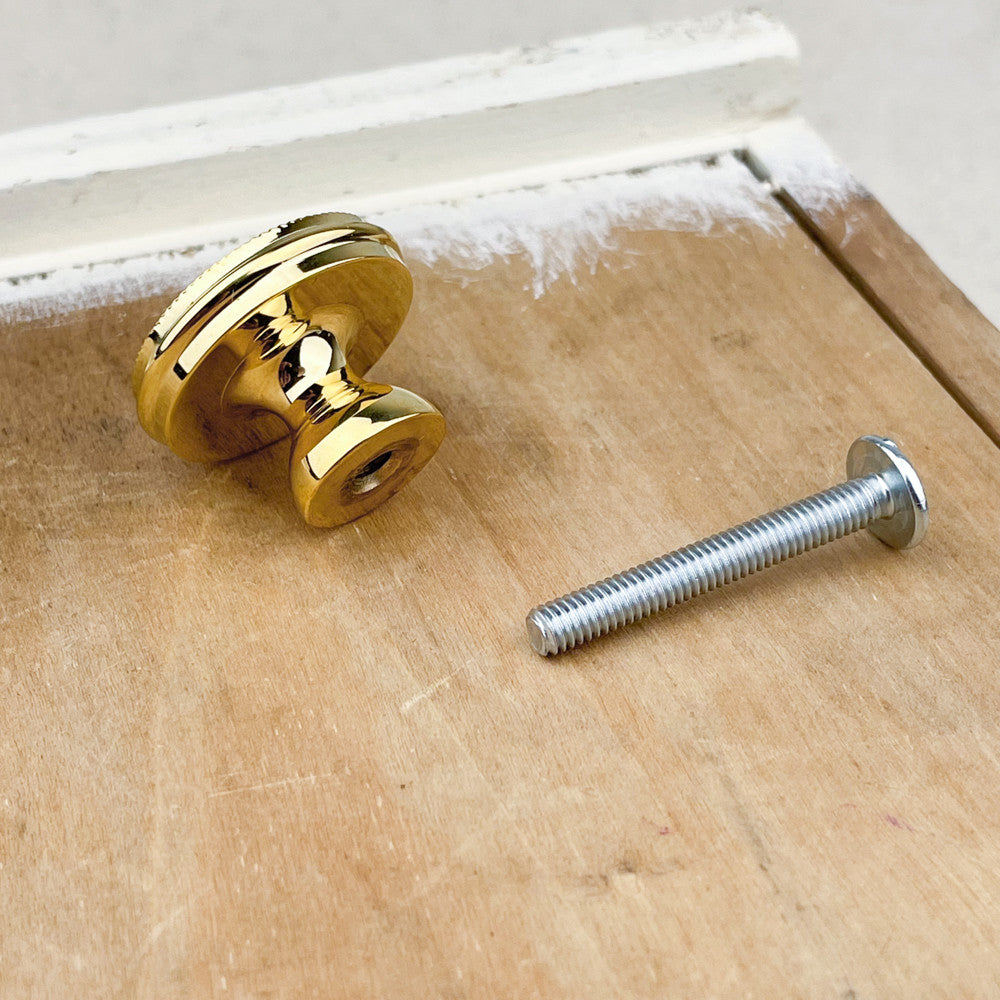 Bouton cuvette molette en laiton poli