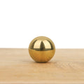 Bouton de meuble boule laiton poli