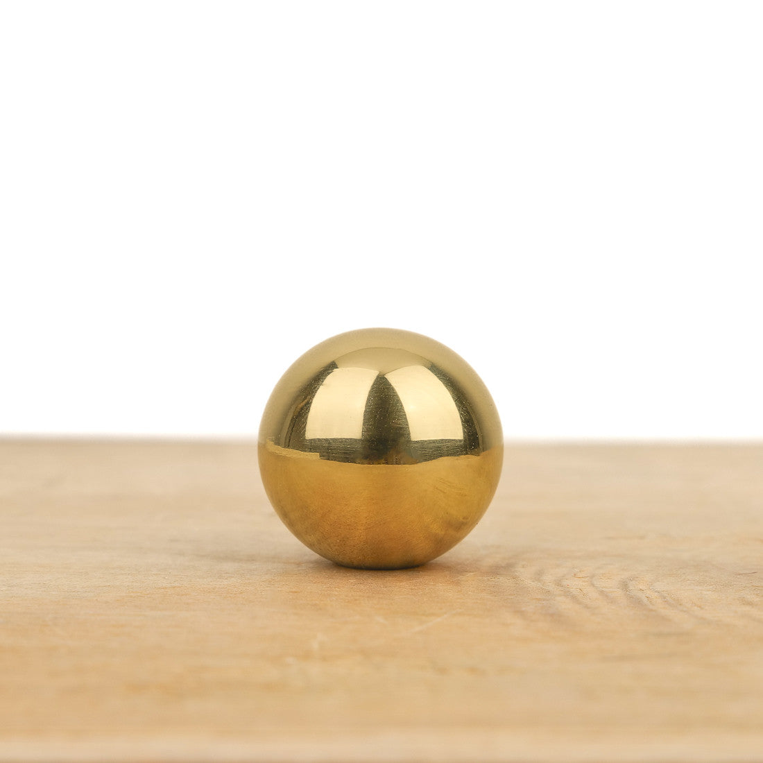 Bouton de meuble boule laiton poli