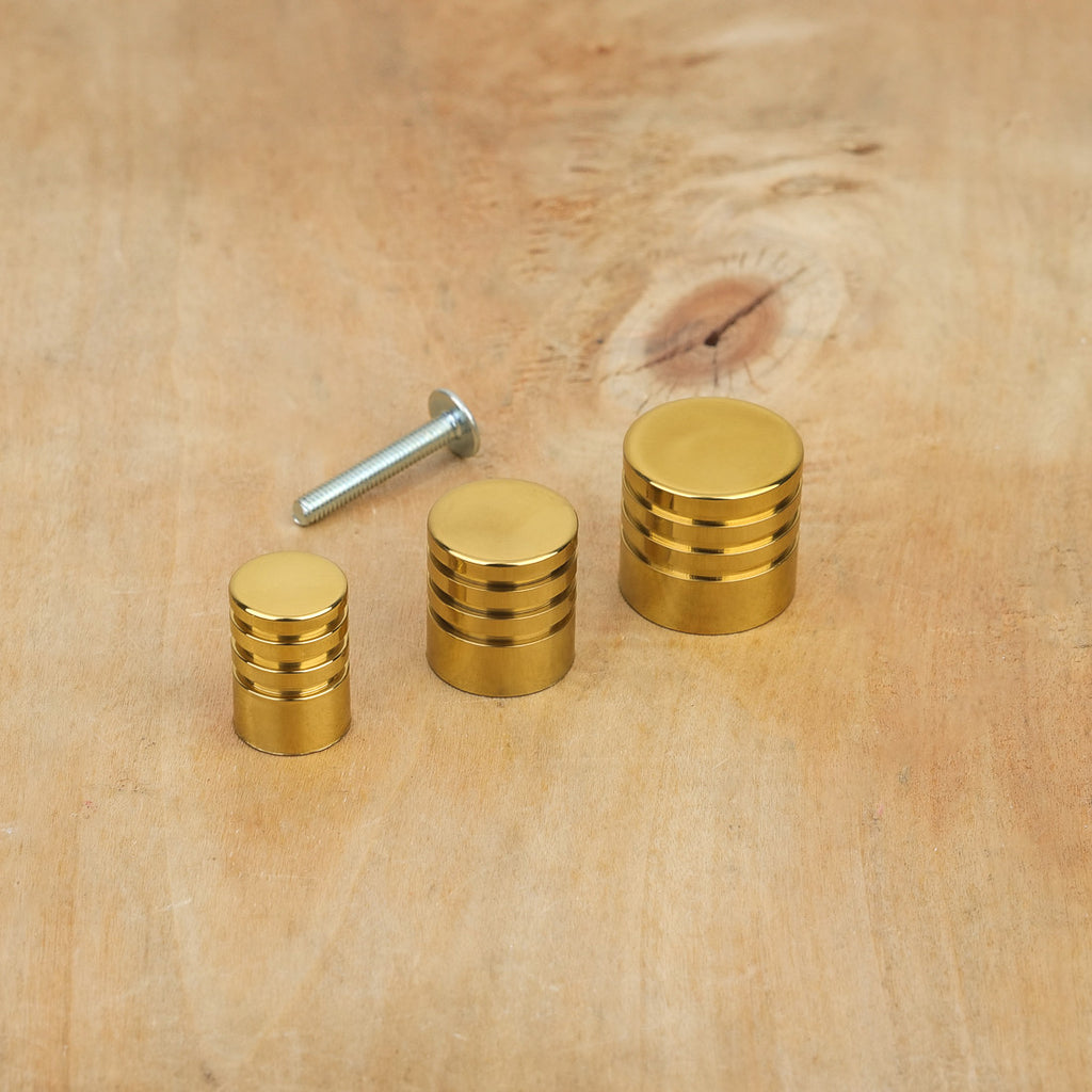 Bouton de meuble cylindre laiton poli