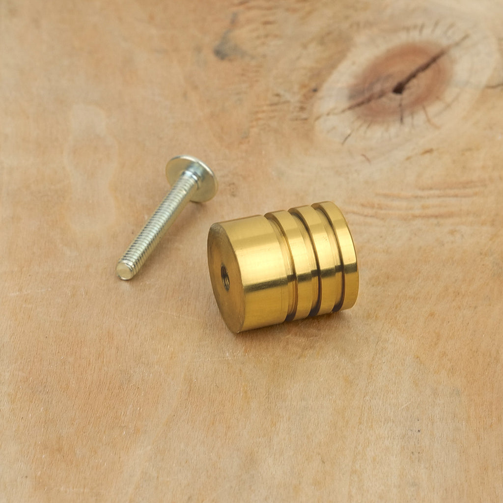 Bouton de meuble cylindre laiton poli