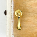 Bouton de meuble goutte en laiton