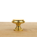 Bouton de meuble plat laiton poli