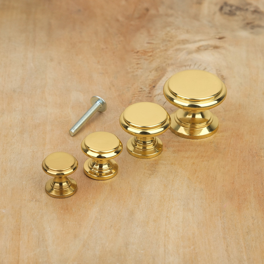 Bouton de meuble plat laiton poli