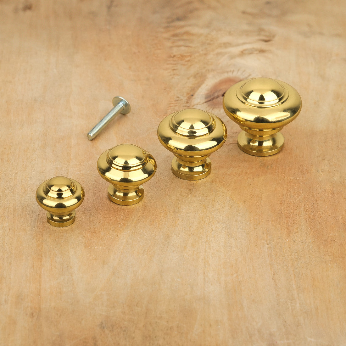 Bouton de meuble tête bombée laiton poli