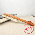 Brosse à livres