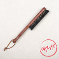 Brosse à vêtements à fils de bronze