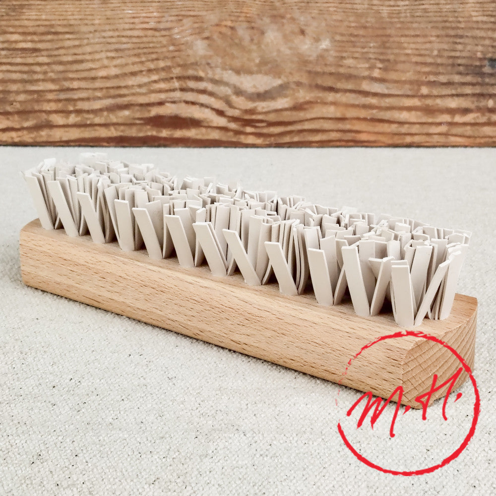 Brosse anti-peluche