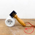 Brosse de nettoyage pour prises électriques