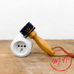Brosse de nettoyage pour prises électriques