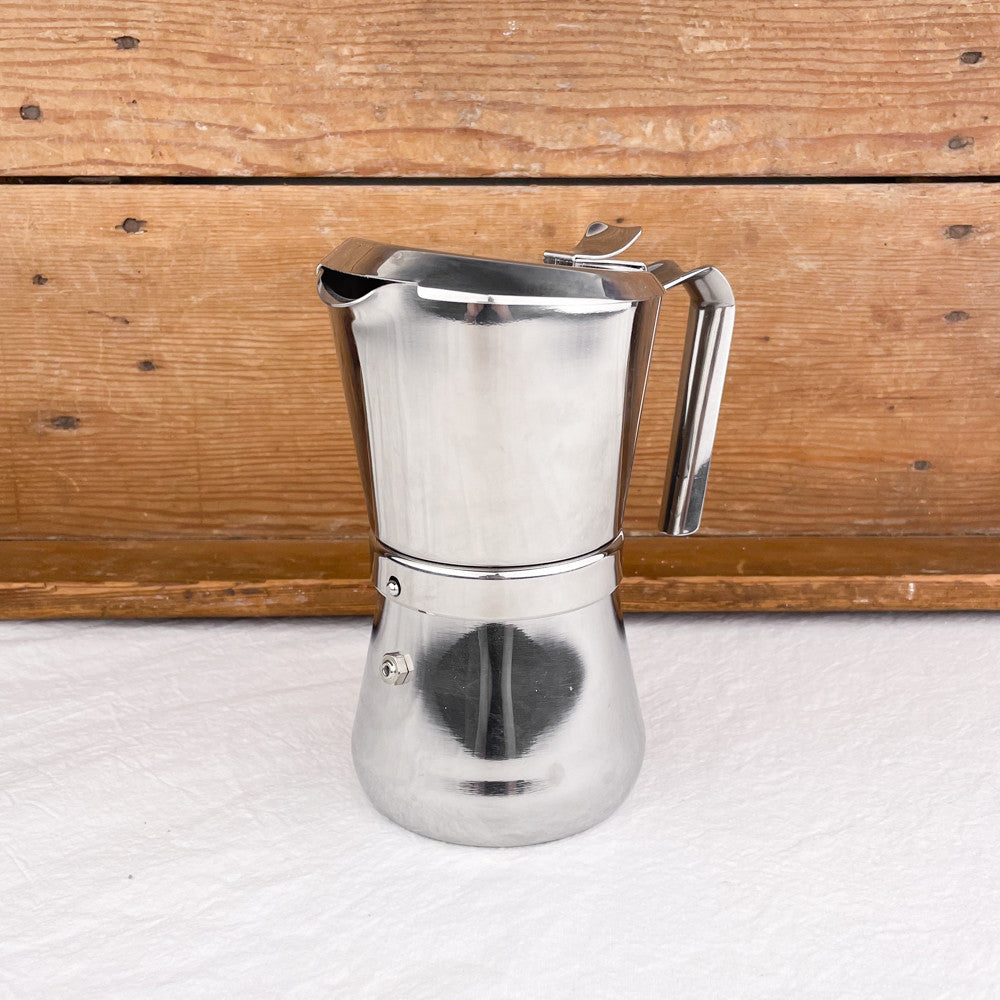 Cafetière italienne avec fermeture par rotation de la poignée